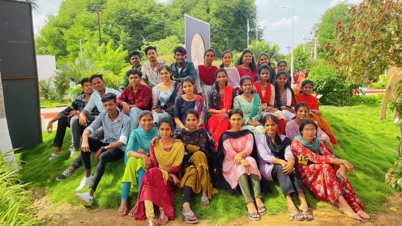 Students Relaxing on Campus Lawns